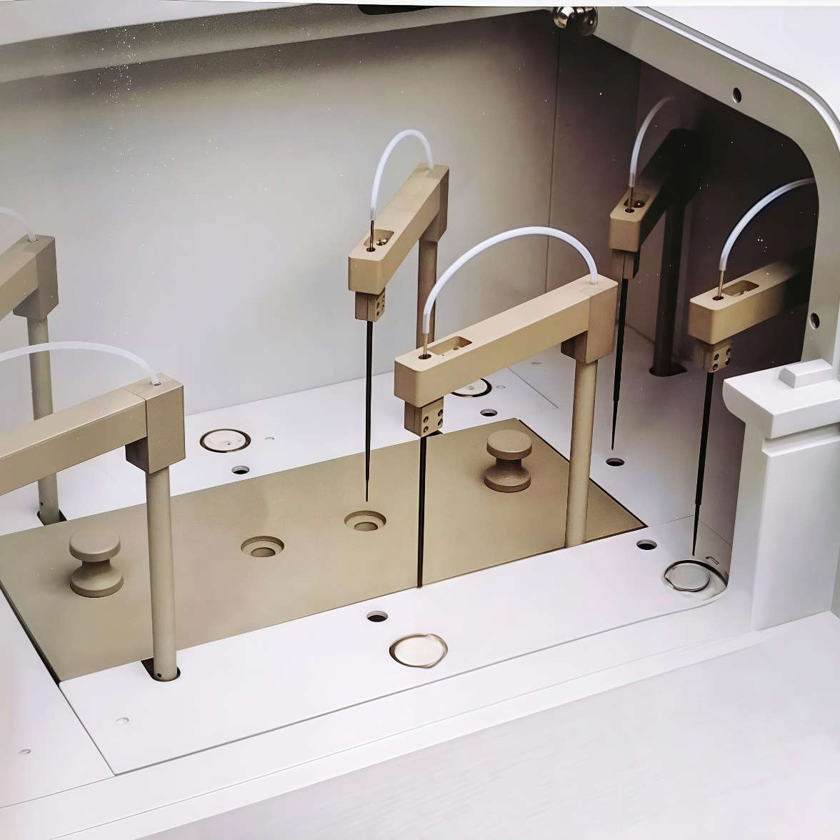 Reagent piercing needle installed in hematology analyzer, laboratory instrument component in use